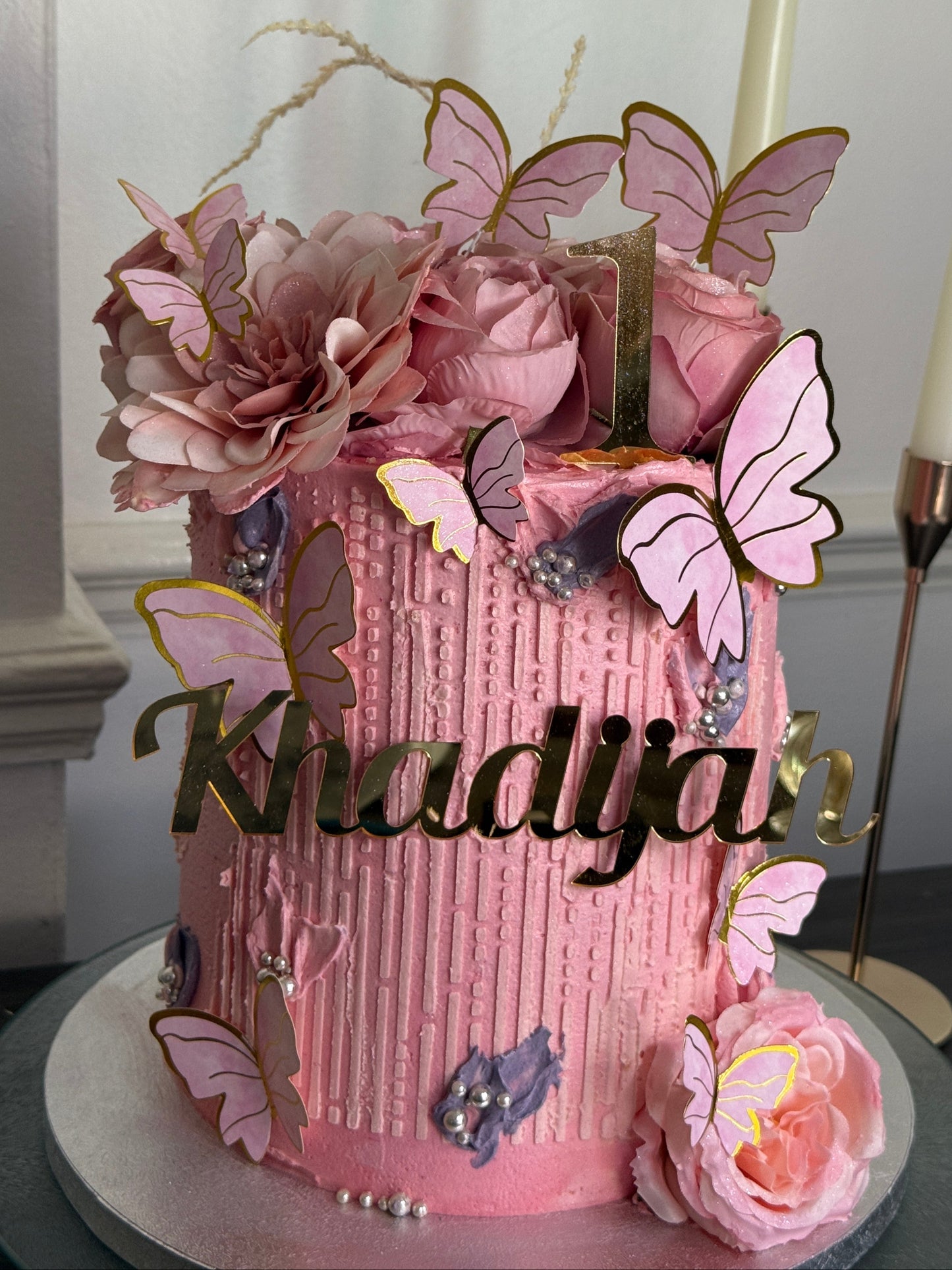 Tall pink birthday cake with butterflies and flowers – Barking & East Ham cakes