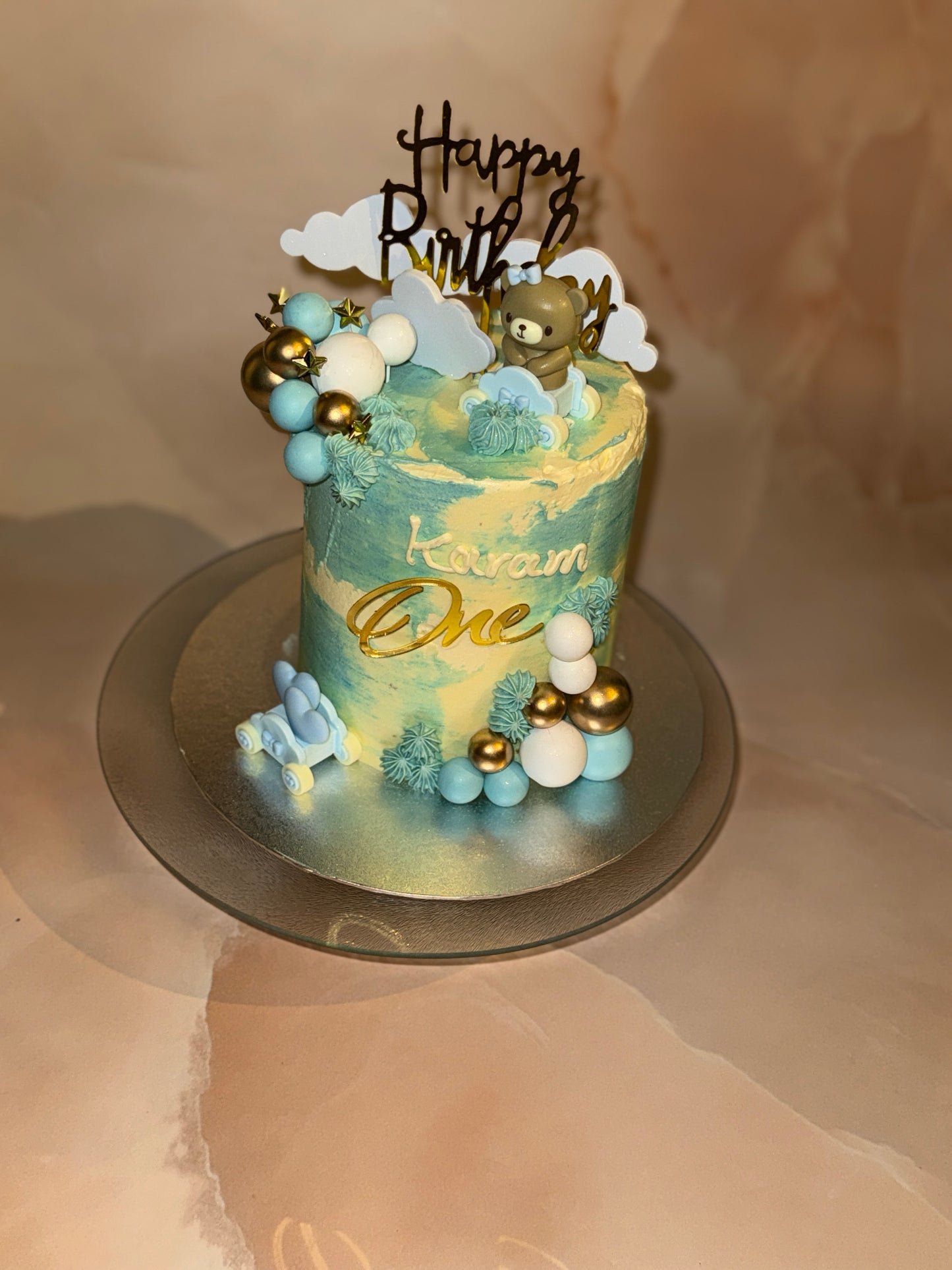 Teddy-themed cake for first birthday celebration in East London