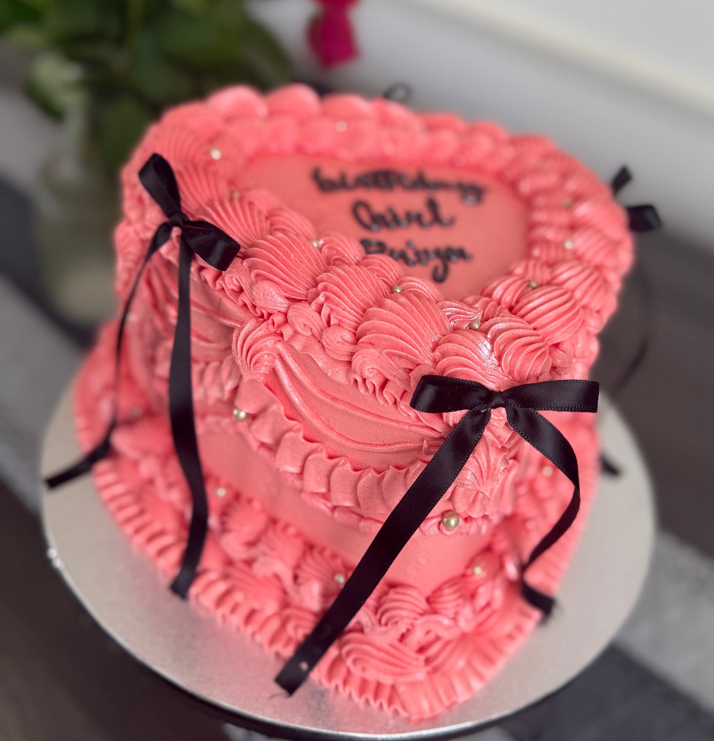 Luxury heart cake with black ribbon and jewel accents delivered to IG6 Barkingside and RM2 Gidea Park