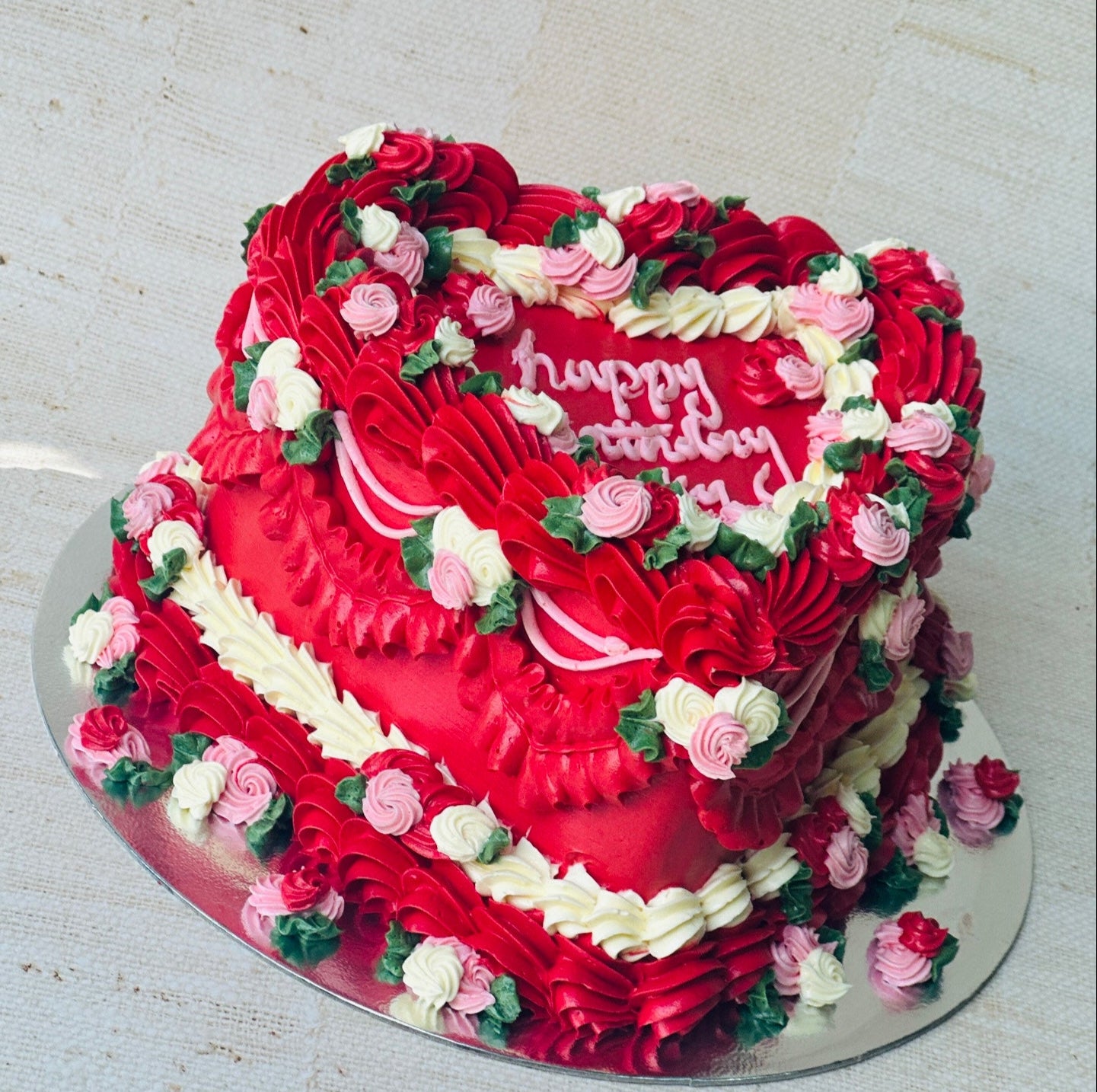 Buy red heart birthday cake in Romford and Ilford – floral buttercream design perfect for birthdays and celebrations.