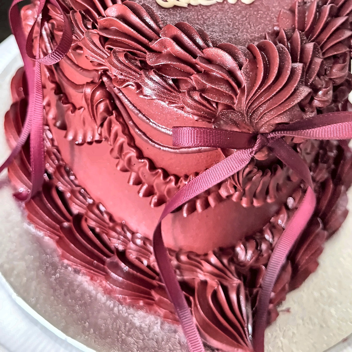 Crimson Heart Vintage Cake with Satin Ribbons close-up detail
