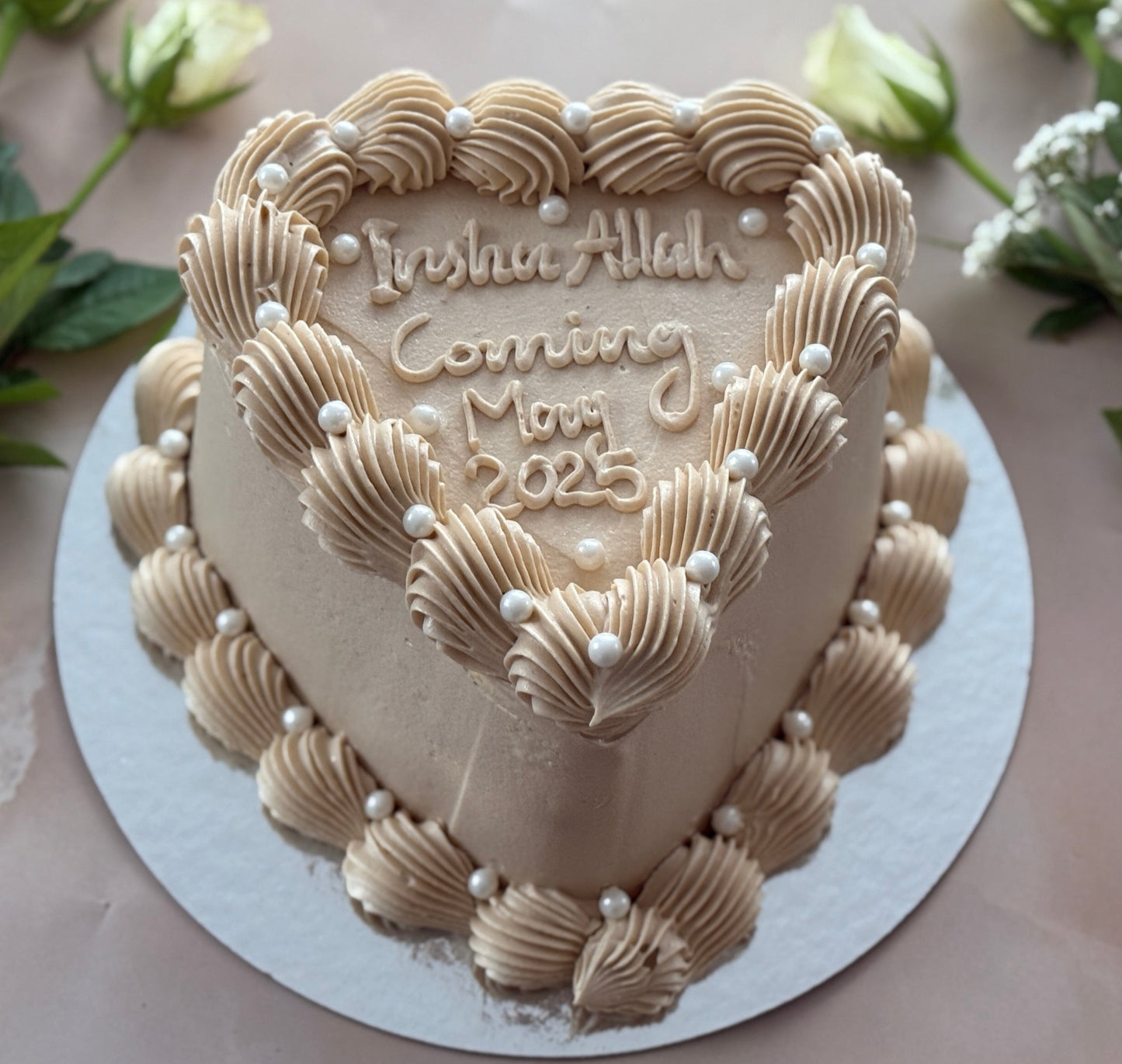 Custom beige heart cake with piped buttercream in RM2 Gidea Park and E13 Plaistow