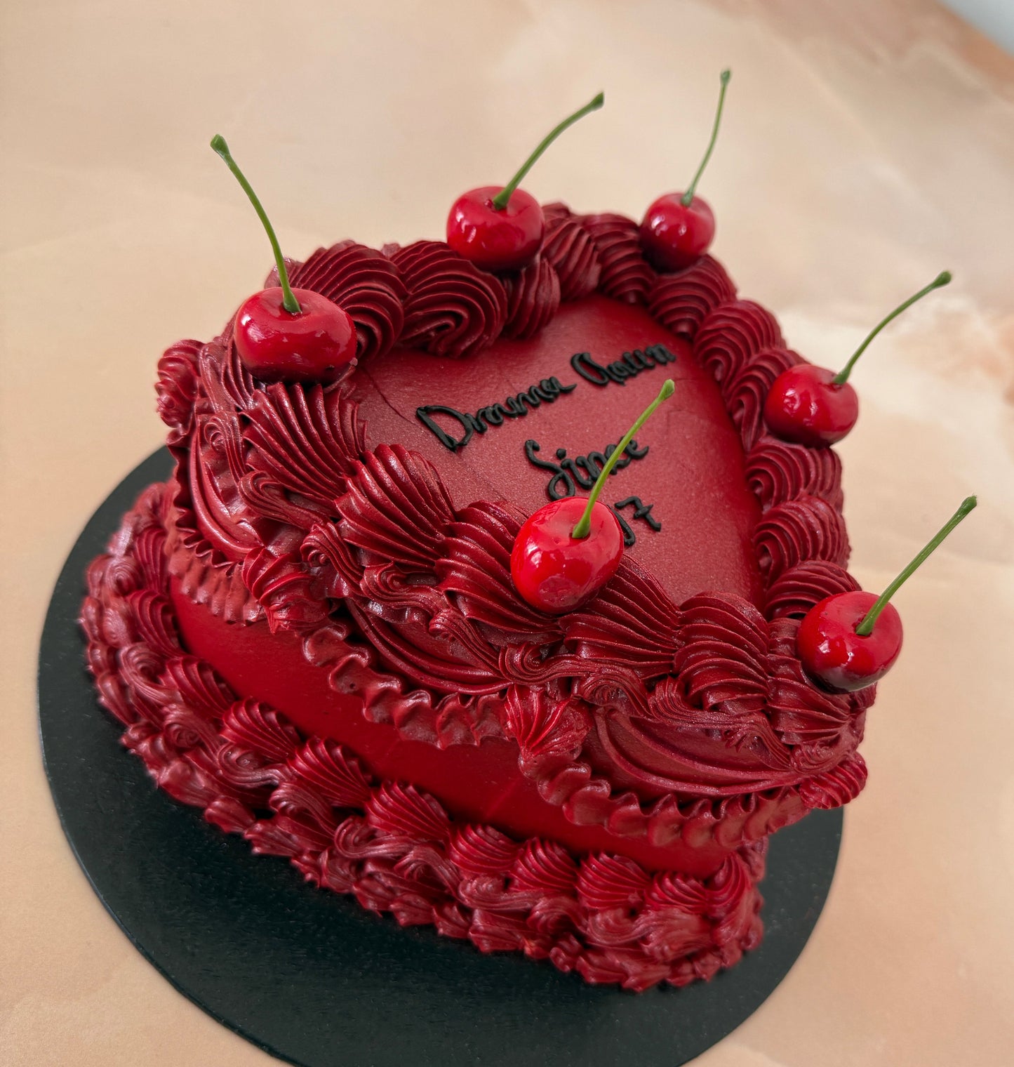 Deep red heart cake with cherry garnish delivered to E17 Walthamstow and IG3 Seven Kings