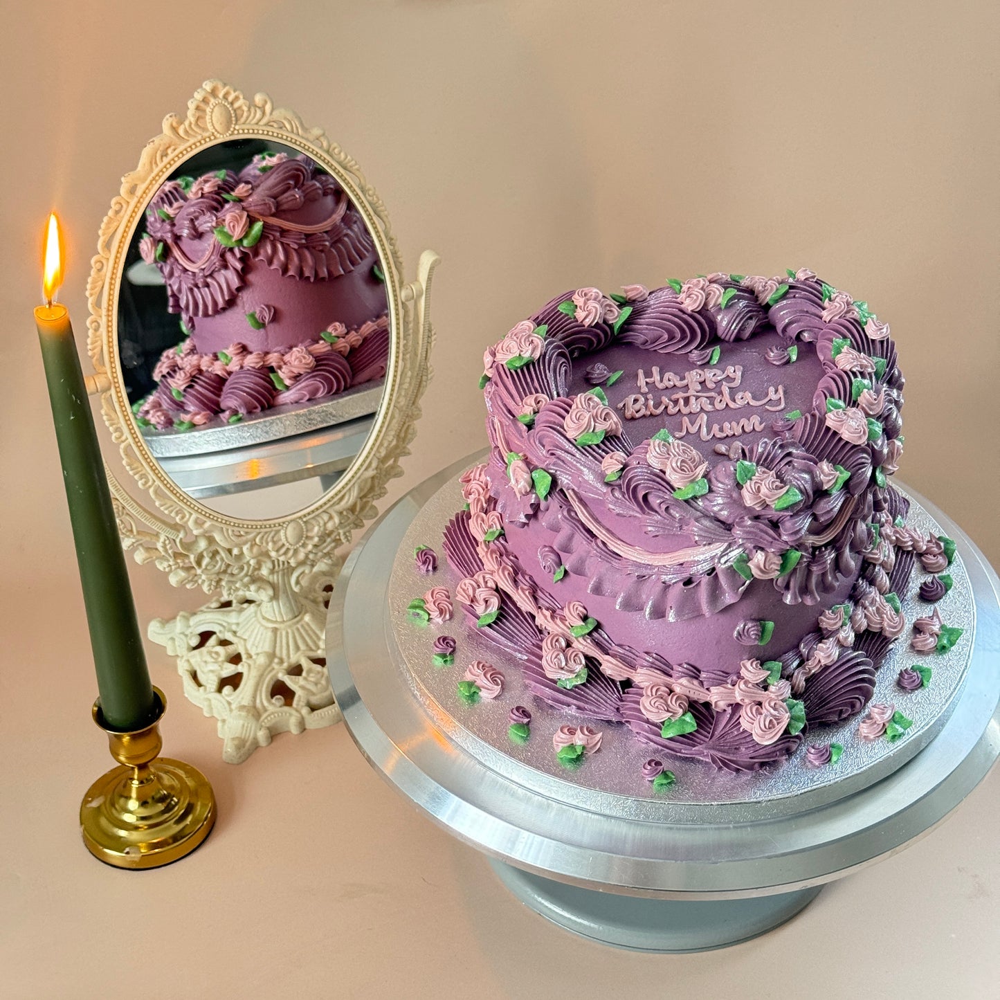 Side view of the purple vintage Lambeth birthday cake with intricate hand piping — custom cakes East London, Romford and Ilford.