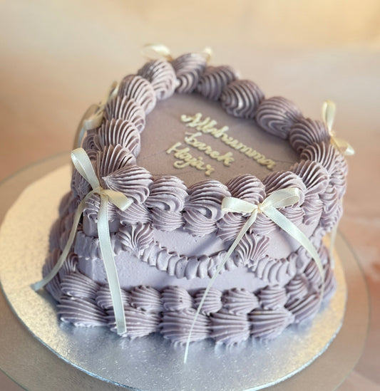 Ribbon piped heart cake with elegant lilac swirls delivered to IG7 Chigwell and RM5 Collier Row