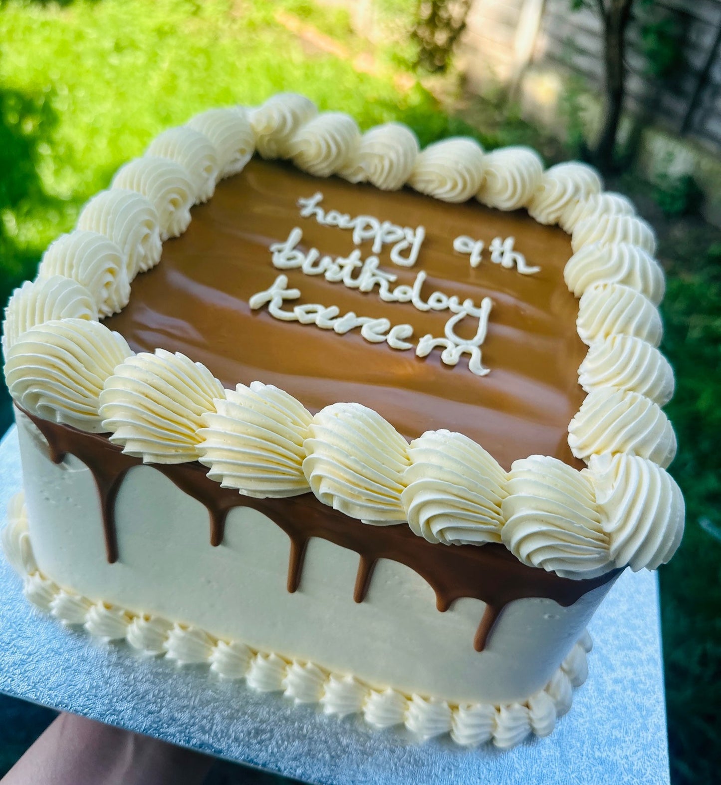 Chocolate square birthday cake with ganache drip