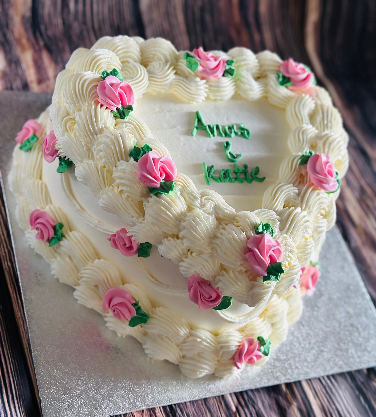 White buttercream heart cake with pink rose detailing, available for same-day delivery in Romford and Chigwell.