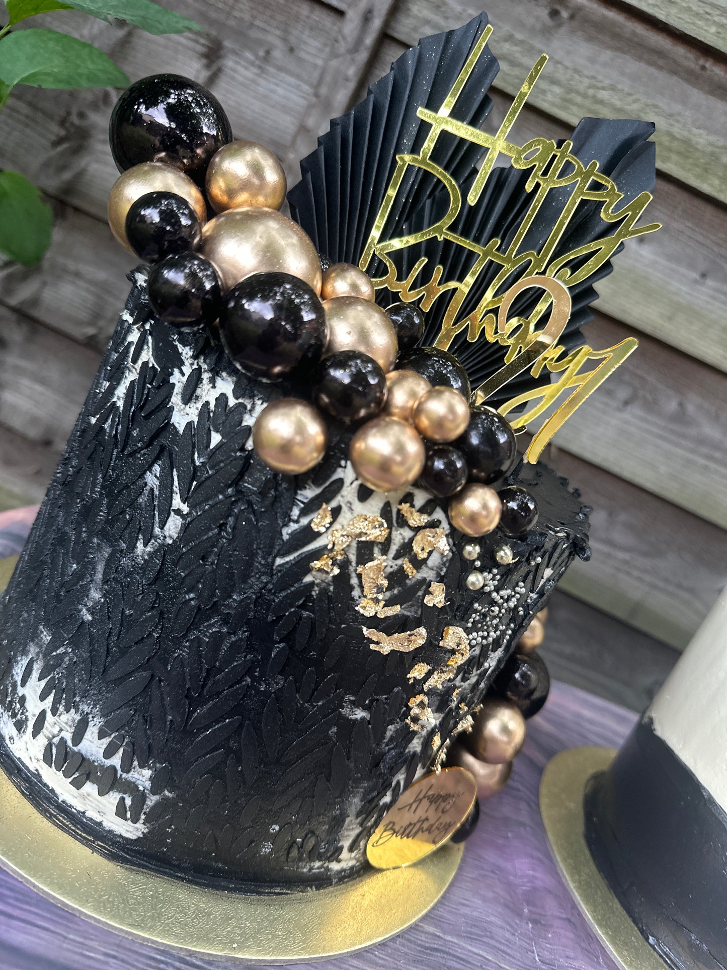 Textured Black Birthday Cake with Gold Balls – Celebration Cakes in Dagenham