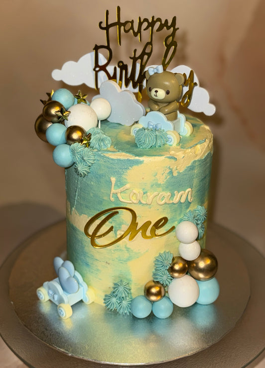 Custom 1st birthday cake for baby boy with teddy bear in Romford