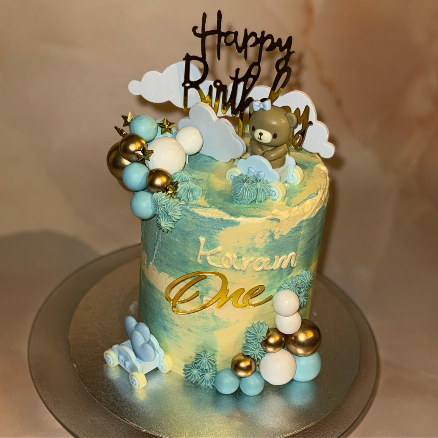 Teddy-themed cake for first birthday celebration in East London