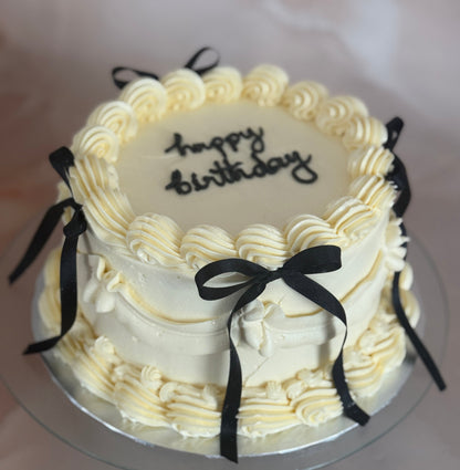 Vintage Bow Cake with black ribbon detail for East London delivery