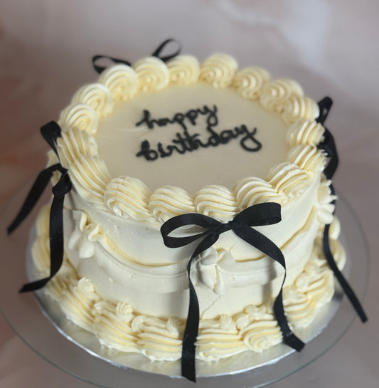 Vintage Bow Cake with black ribbon detail for East London delivery