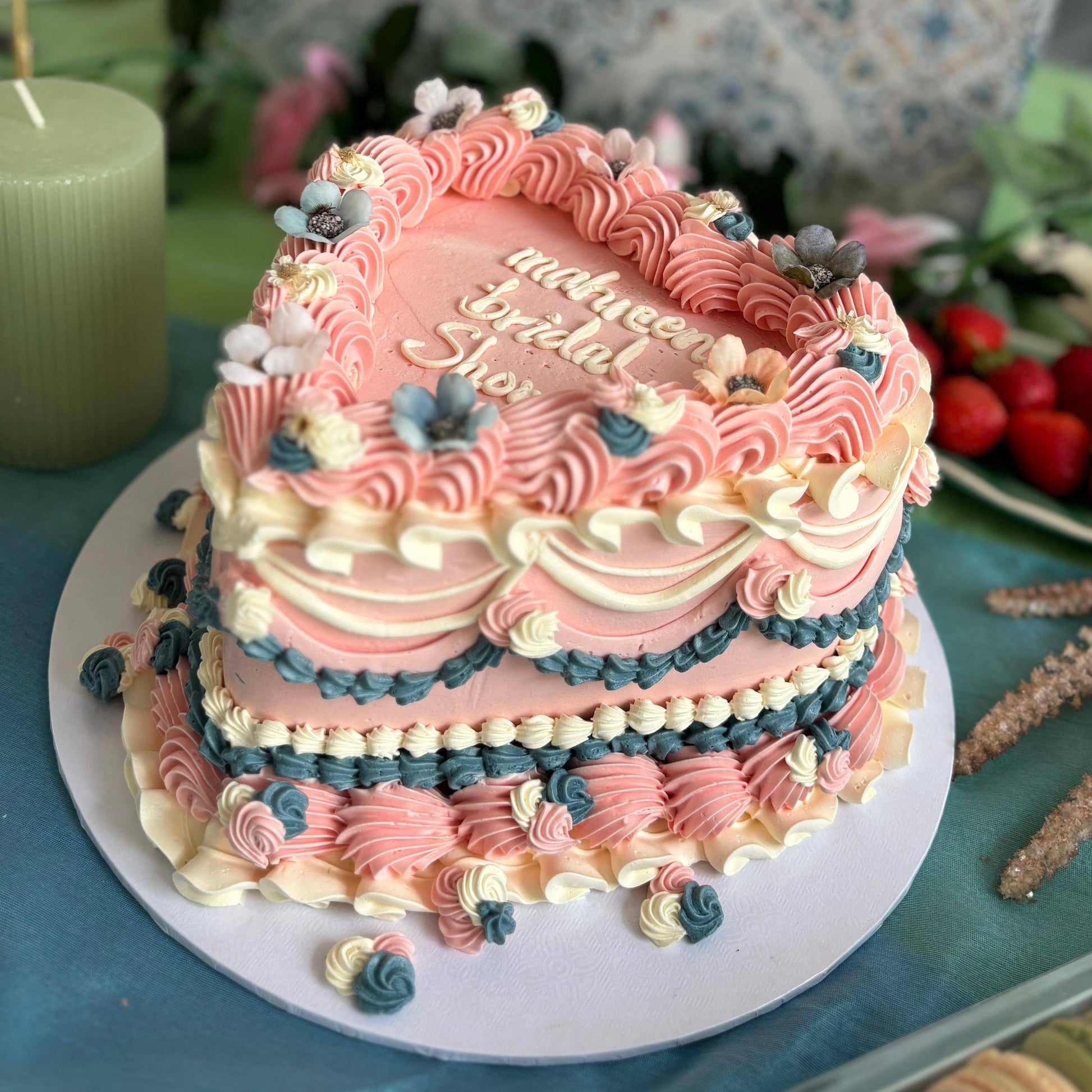 Best bridal shower heart cake in Dagenham and South Woodford – romantic celebration cake decorated with pastel flowers.