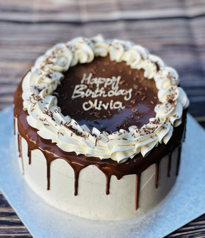 Best drip birthday cake in Walthamstow and Forest Gate, chocolate ganache design with piped buttercream border.
