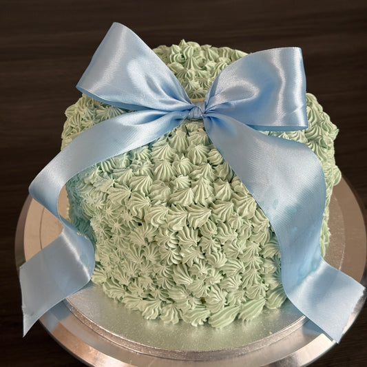 Big Bow Celebration Cake with blue satin ribbon – birthday cake delivery in East London and Romford.