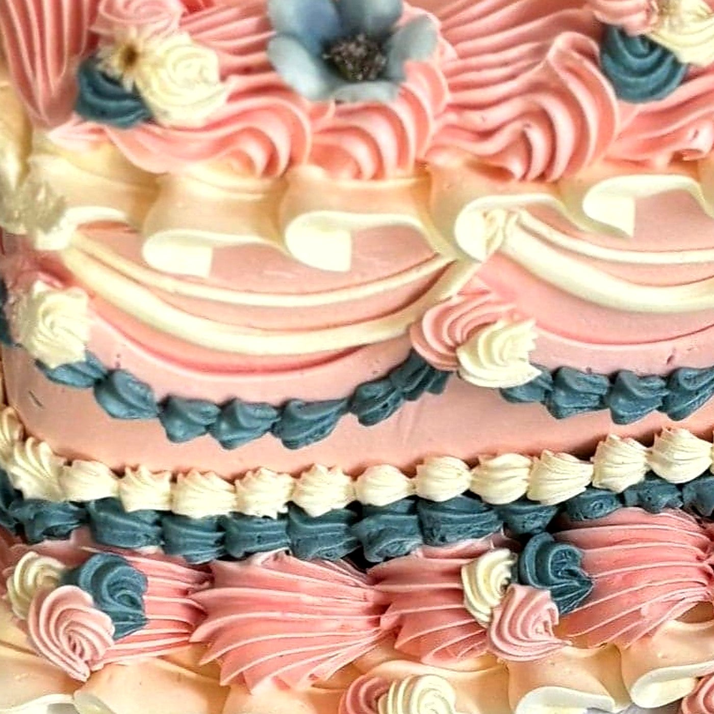 Cream Lambeth swag piping and teal shell borders on a pink vintage heart cake, delivered to East Ham