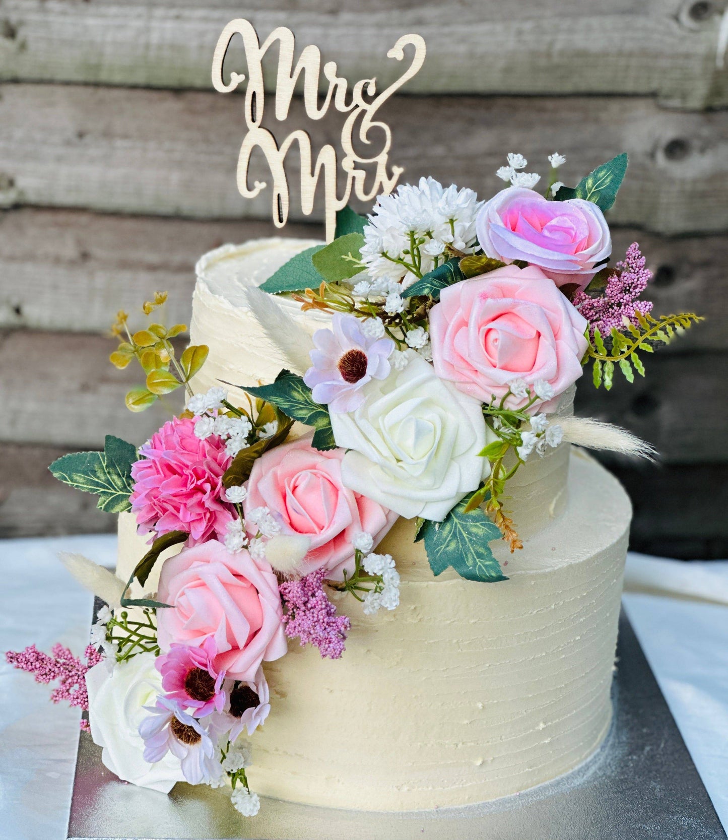 Buy blush bloom wedding cake with floral decoration in Ilford and East Ham – perfect for couples celebrating their big day.