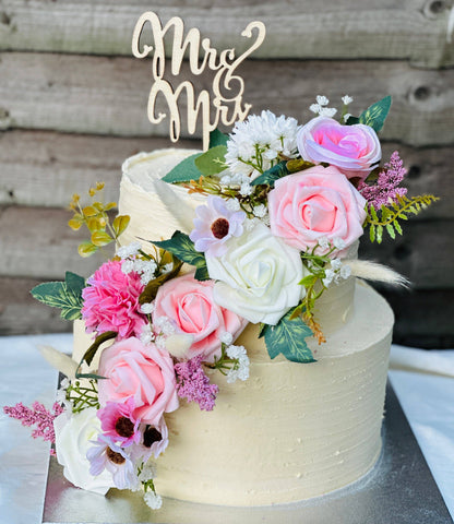Buy blush bloom wedding cake with floral decoration in Ilford and East Ham – perfect for couples celebrating their big day.