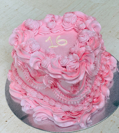 Buy sweet sixteen heart cake in Romford and Ilford – pink vintage buttercream design perfect for milestone birthdays.