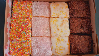 Rows of cake slices in a gift box, perfect for gifting and events in Stratford and Chigwell, East London.