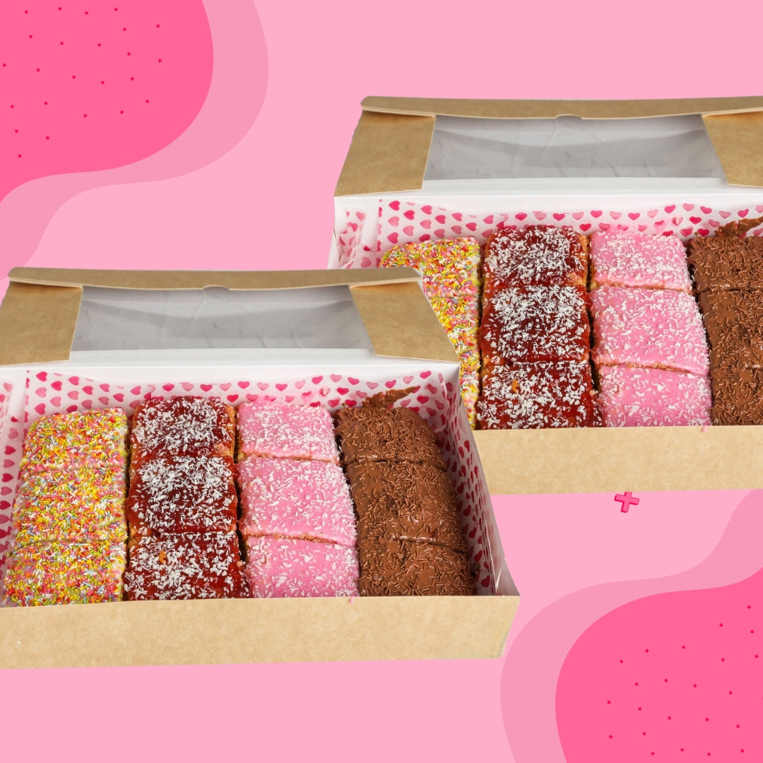 Two cake gift boxes filled with assorted school cake slices on a pink background, available for same day delivery in Romford and Ilford, East London.