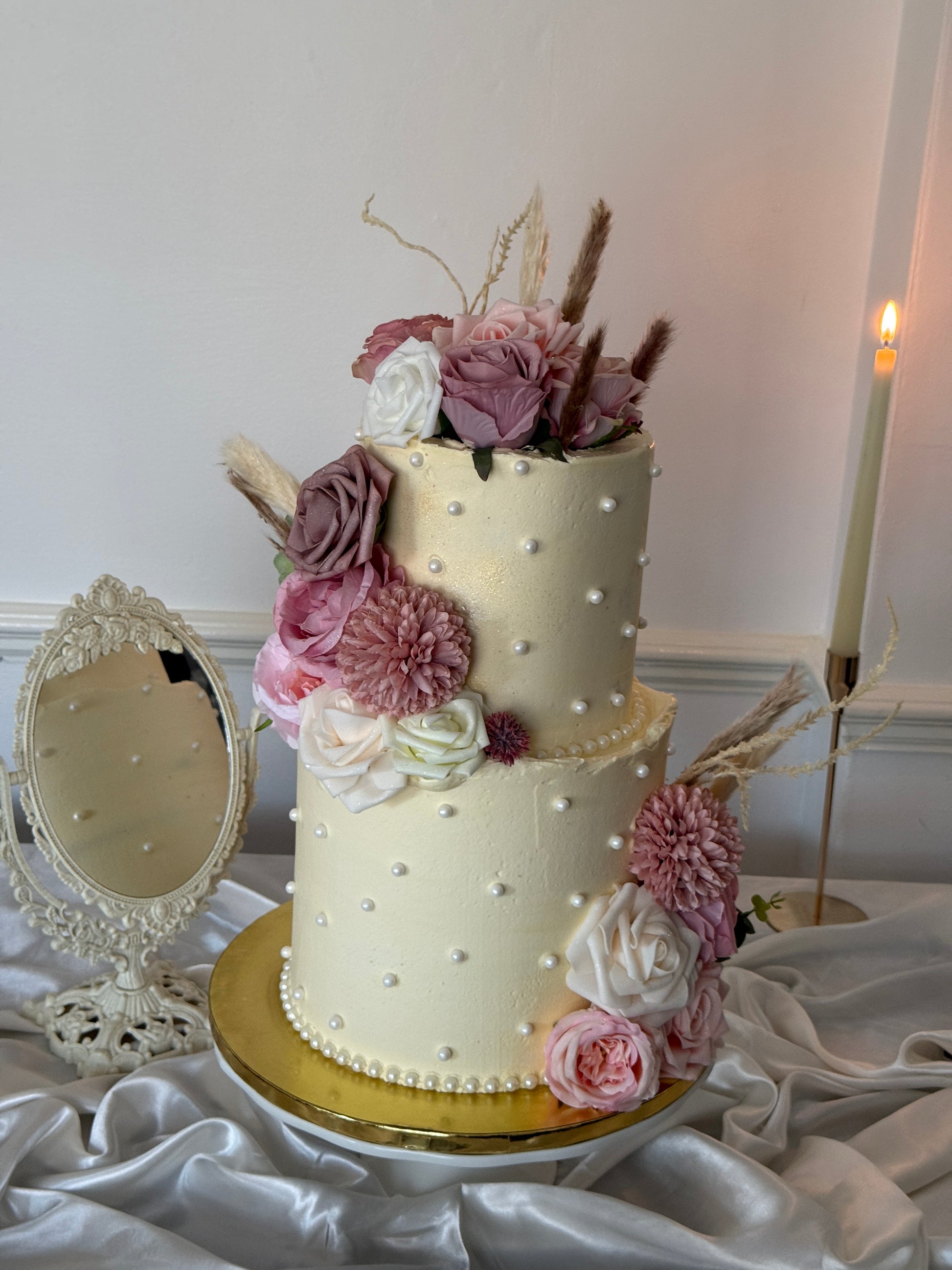 Close-up of pearl buttercream detailing on the Pearl Offset Two Tier Wedding Cake, made fresh to order by Cake Trays in Stratford and Plaistow.