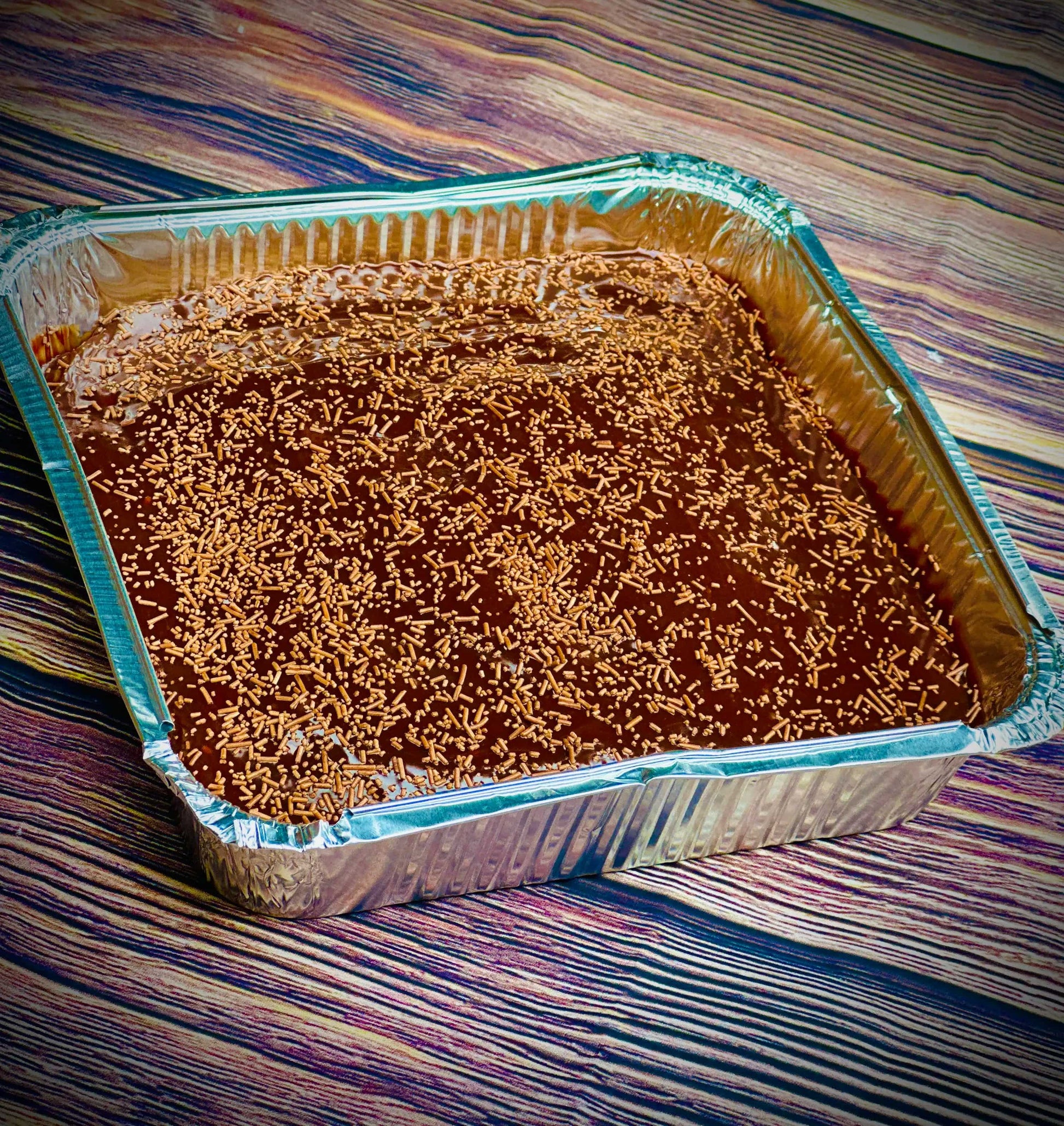 Chocolate cake tray topped with chocolate icing, available for same day delivery in Romford and Ilford, East London.