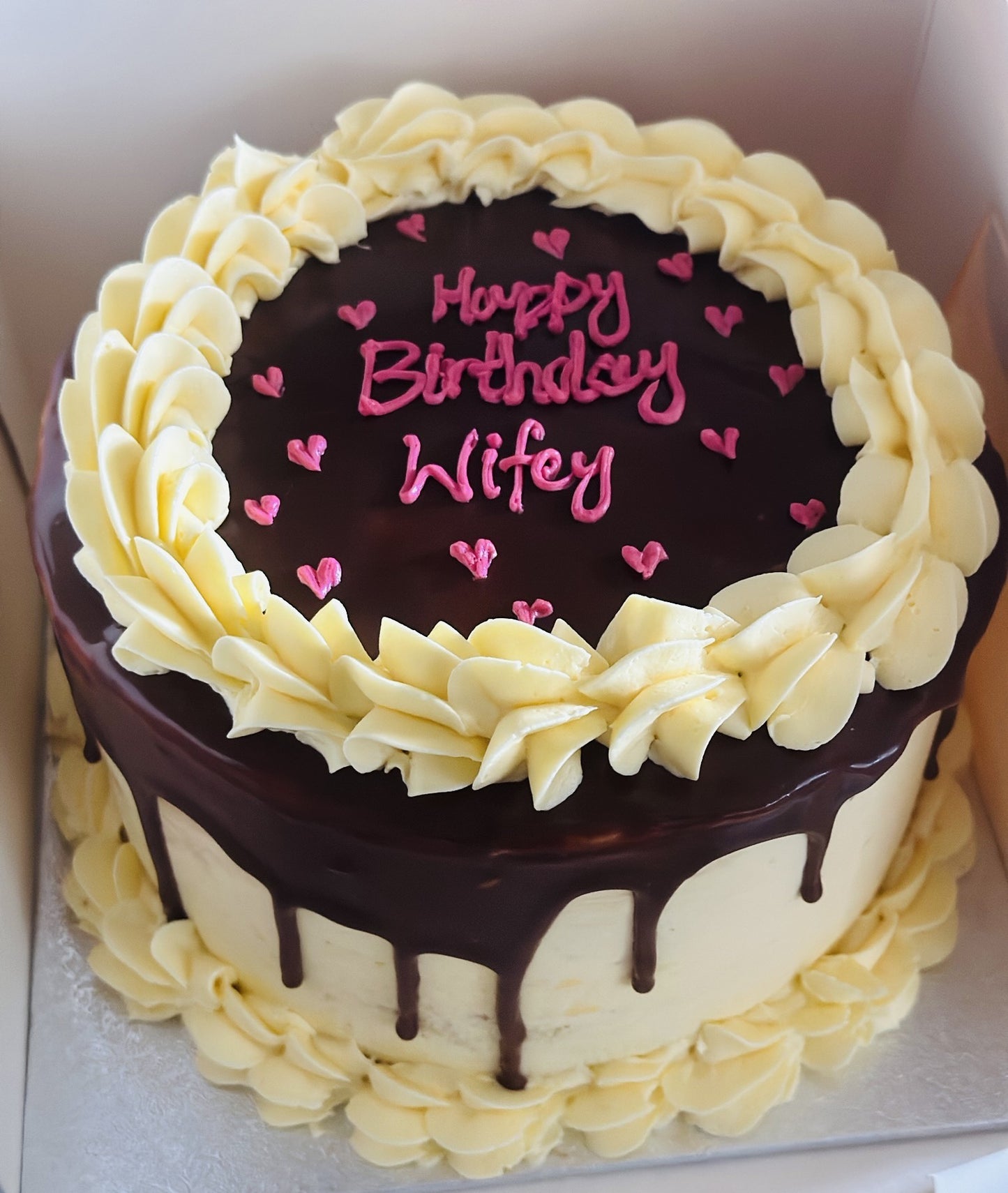 Vanilla sponge with chocolate drip and swirls, delivered in Barking and Dagenham.