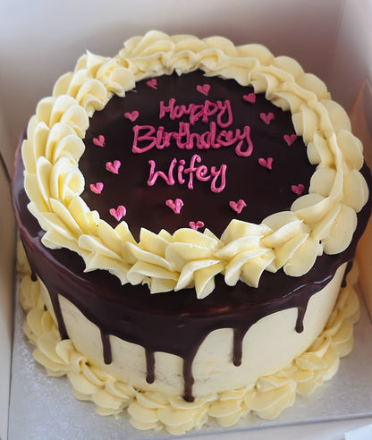 Vanilla sponge with chocolate drip and swirls, delivered in Barking and Dagenham.