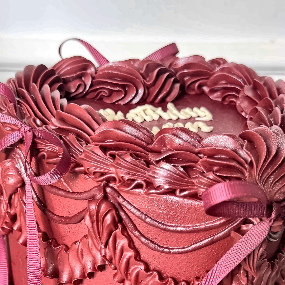 Crimson Heart Vintage Cake with Satin Ribbons close-up detail