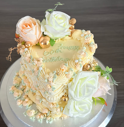 Elegant vintage heart-shaped floral cake for birthdays in Ilford and East London