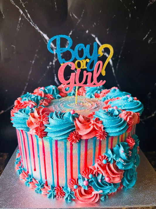 Colourful gender reveal cake with a touch of mystery