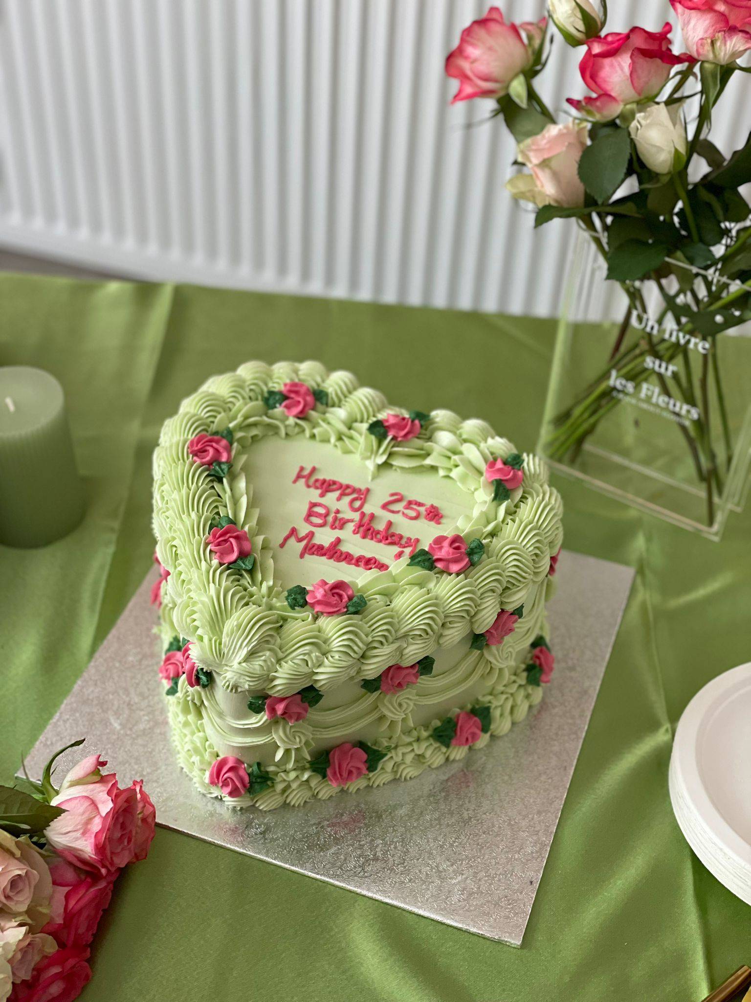 Heart-shaped Vintage Cake CT15 with green buttercream and floral decorations, delivered fresh in Walthamstow and surrounding East London areas.