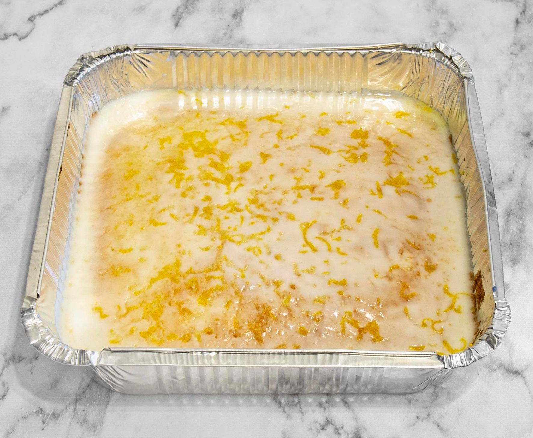 Lemon cake tray with lemon icing and zest, available for same day delivery in Romford and Ilford, East London.