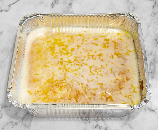 Lemon cake tray with lemon icing and zest, available for same day delivery in Romford and Ilford, East London.