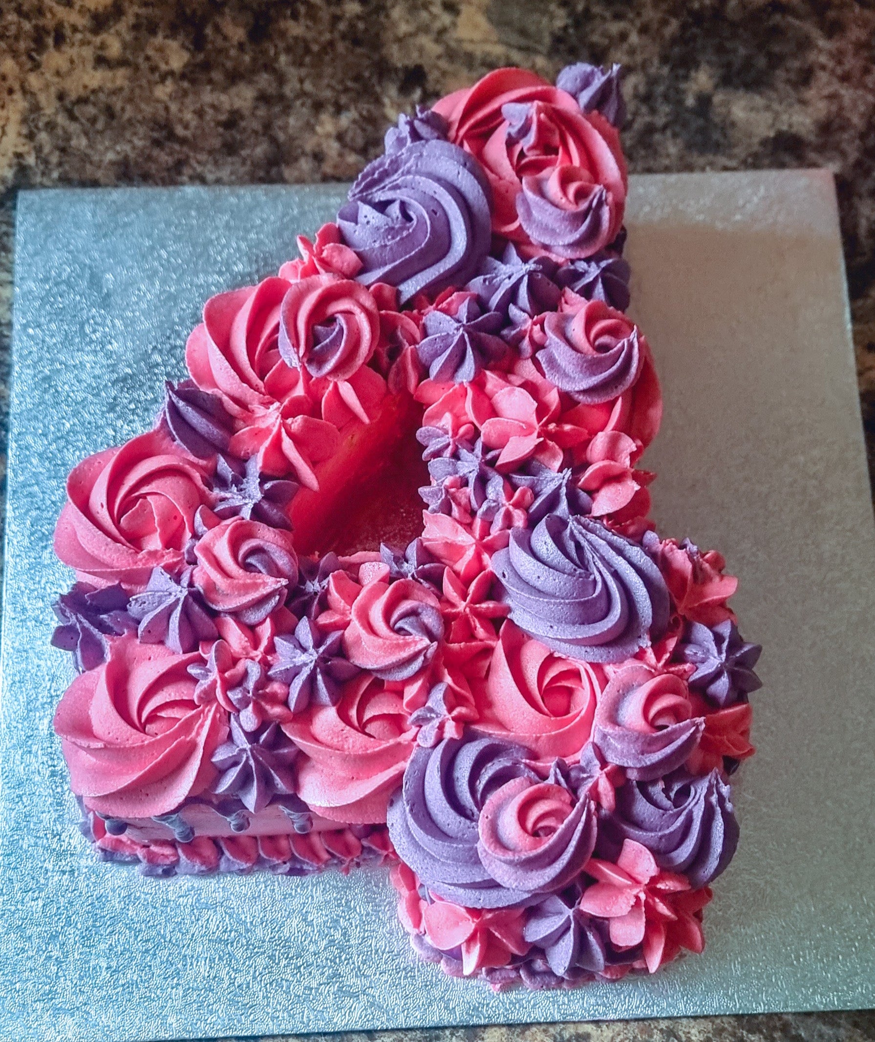 Local bakery number cake with buttercream decoration, available for delivery in Goodmayes and Collier Row.