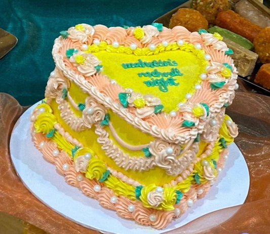 Mehndi heart cake decorated with colourful floral buttercream, available for delivery in Romford and Goodmayes.
