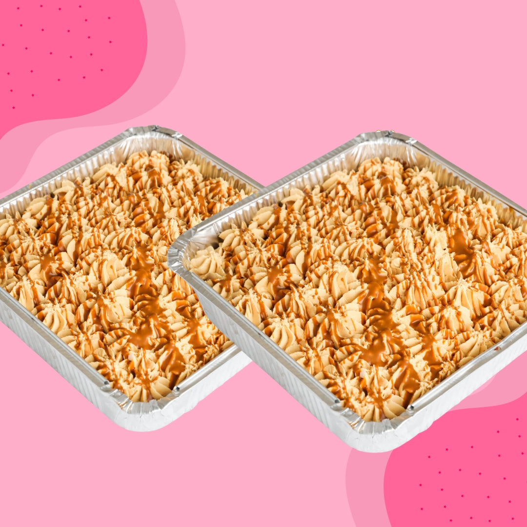 Two milk cake trays with creamy milk syrup and pistachio topping, part of the 2-for-£38 special offer, available for same day delivery in Romford and Ilford.