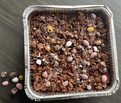 The Mini Eggs chocolate crunch tray served at a family celebration making the perfect shareable dessert for parties in Walthamstow and Stratford.