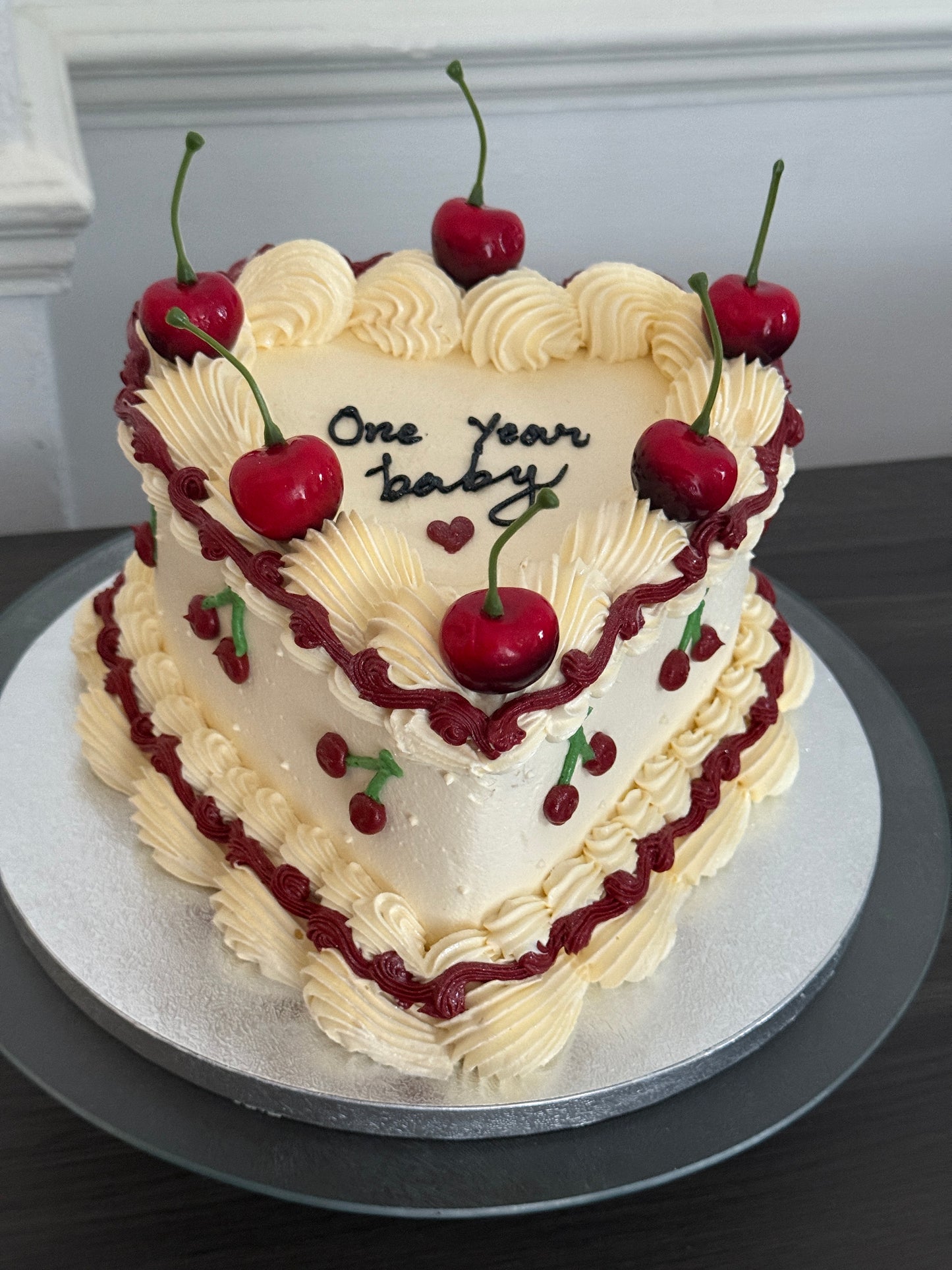 Elegant vintage-style cherry heart cake with piped buttercream swirls and fresh fruit – perfect for birthdays and anniversaries across East London from CakeTrays.co.uk.
