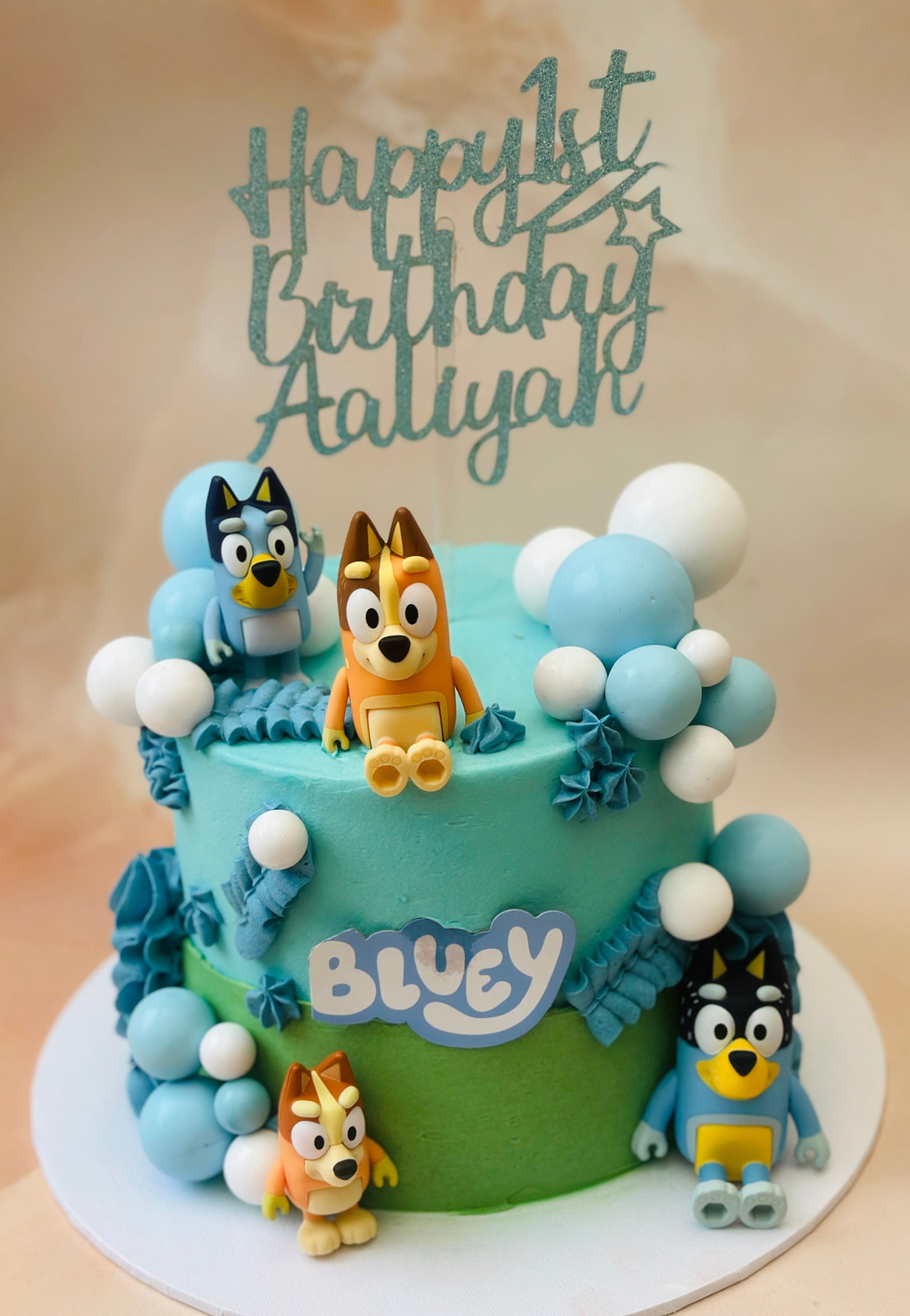 Order Bluey birthday cake online for delivery in Dagenham and East London – colourful design with Bluey figures.