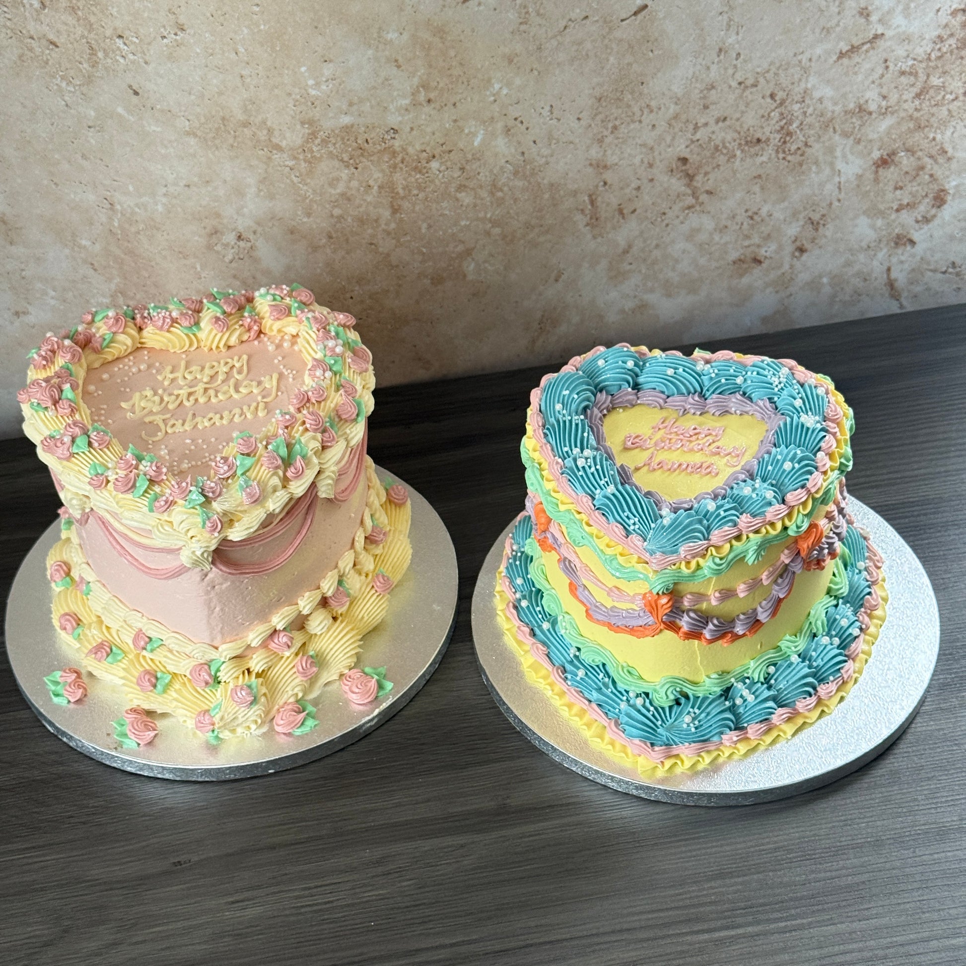 Pink and lemon vintage heart cakes with piped rosebuds and swags — custom cakes East London, Romford and Ilford.