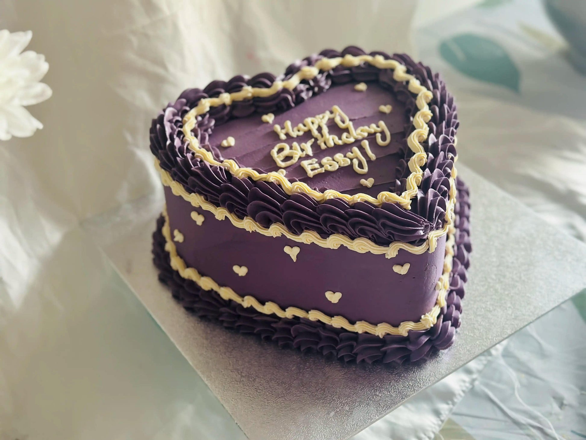 Personalised Heart Cake with purple buttercream and mini heart decorations, delivered in Ilford.