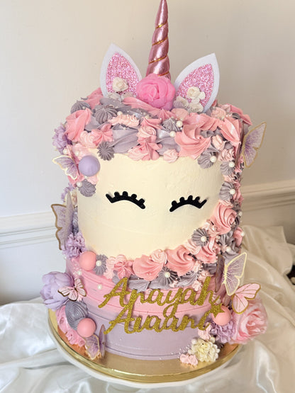 Extra tall pink and lilac unicorn birthday cake with rose gold horn and glitter name topper, custom cakes East London, Romford and Ilford.