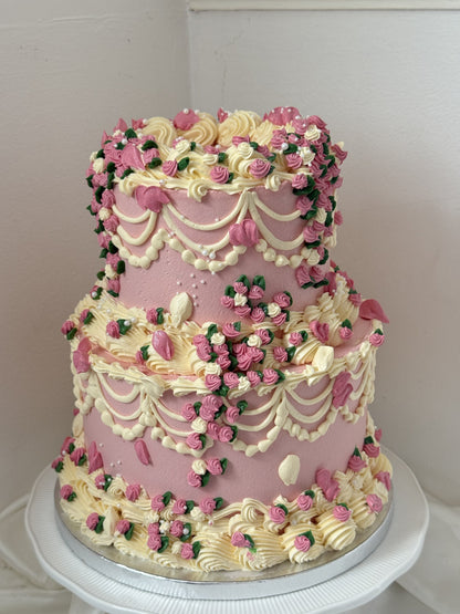Front view of the pink rosebud two-tier vintage cake, custom cakes East London, Romford and Ilford.