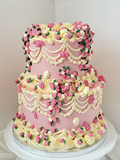 Two-tier dusky pink vintage Lambeth cake with cascading piped rosebuds, custom cakes East London, Romford and Ilford.