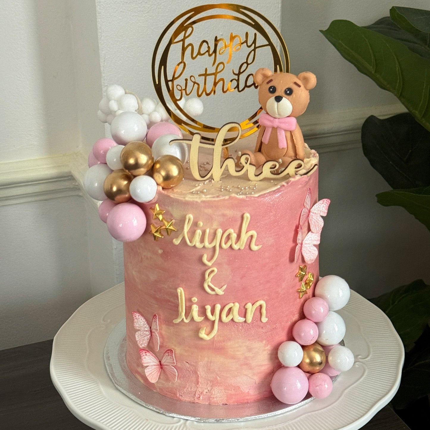 Side view of pink teddy bear birthday cake, custom cakes East London, Romford and Ilford.