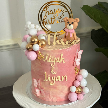 Side view of pink teddy bear birthday cake, custom cakes East London, Romford and Ilford.