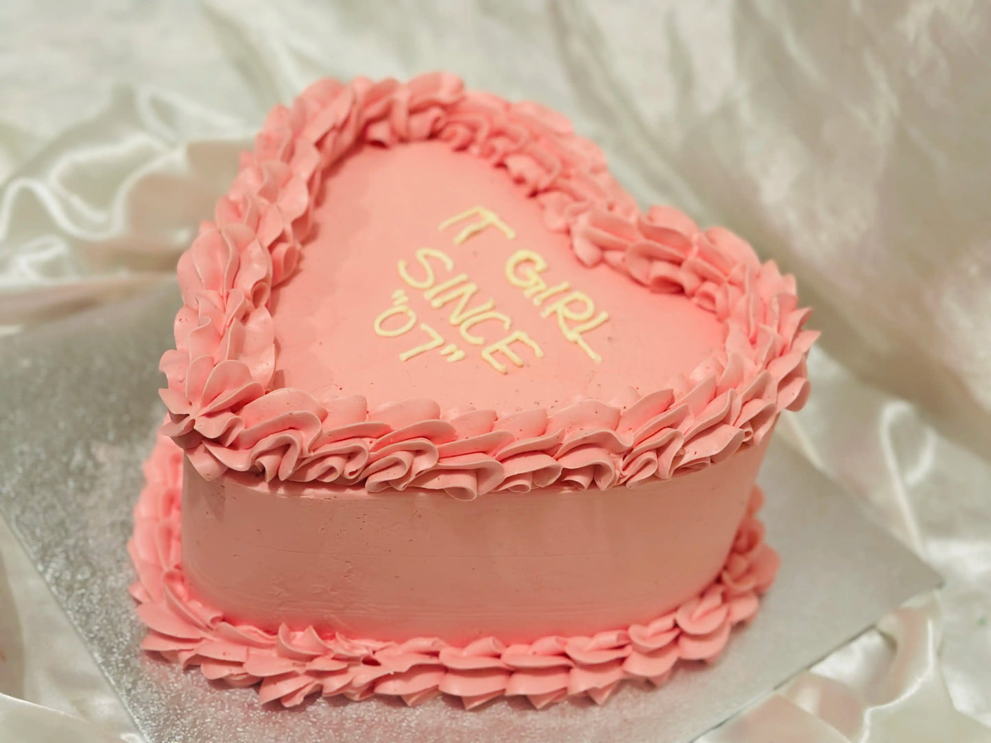 Gourmet heart cake with rich layers and silky icing, a luxurious treat available in East Ham - CakeTrays.co.uk.