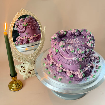 Side view of the purple vintage Lambeth birthday cake with intricate hand piping — custom cakes East London, Romford and Ilford.